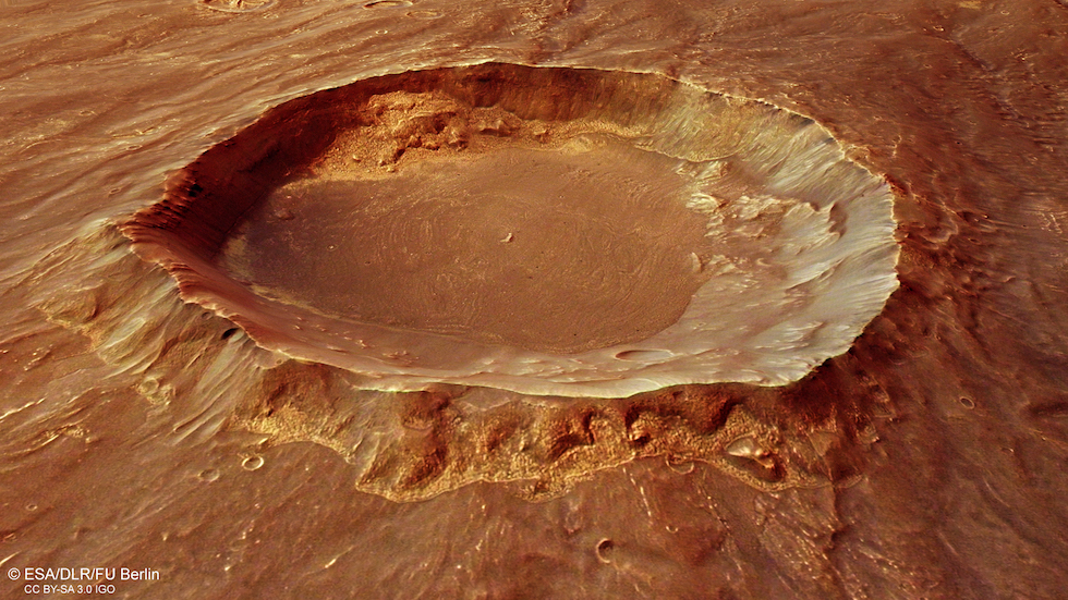 Un cratere dal diametro di 20 chilometri nell’area della Thaumasia, su Marte.

(ESA/DLR/FU Berlin)